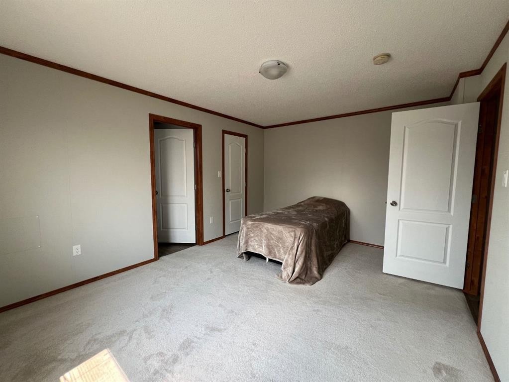 4002 Seasons Boulevard, Coaldale, AB - Indoor Photo Showing Other Room