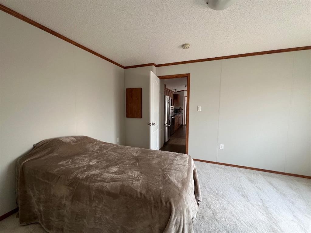 4002 Seasons Boulevard, Coaldale, AB - Indoor Photo Showing Bedroom