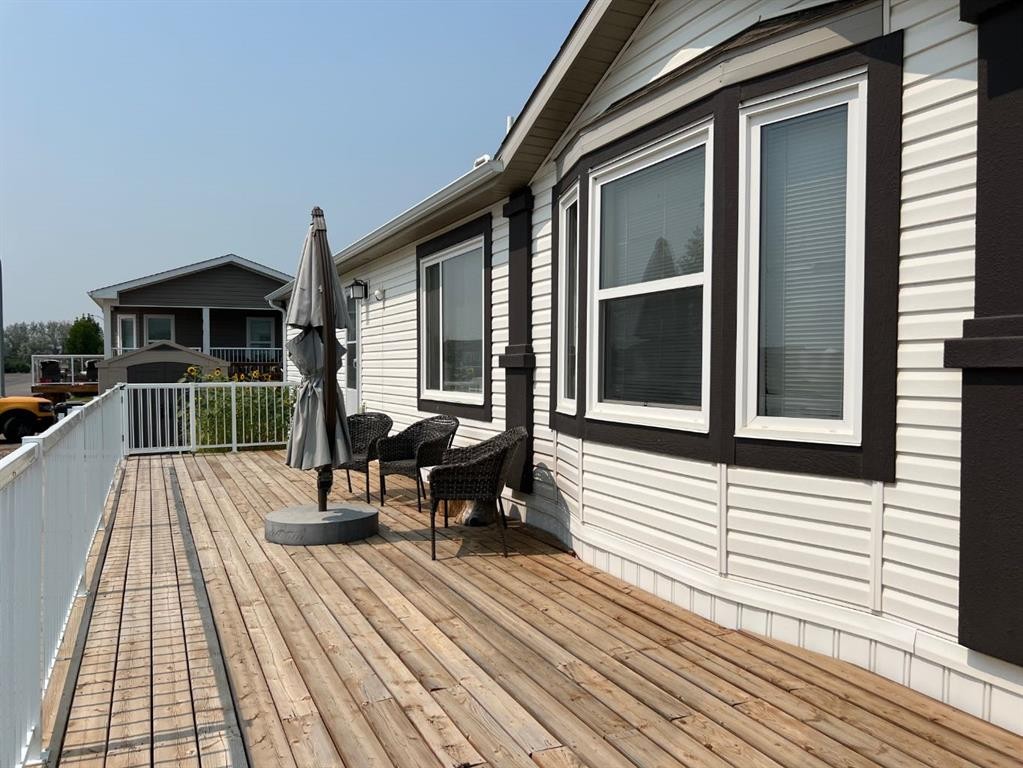 4002 Seasons Boulevard, Coaldale, AB - Outdoor With Deck Patio Veranda With Exterior