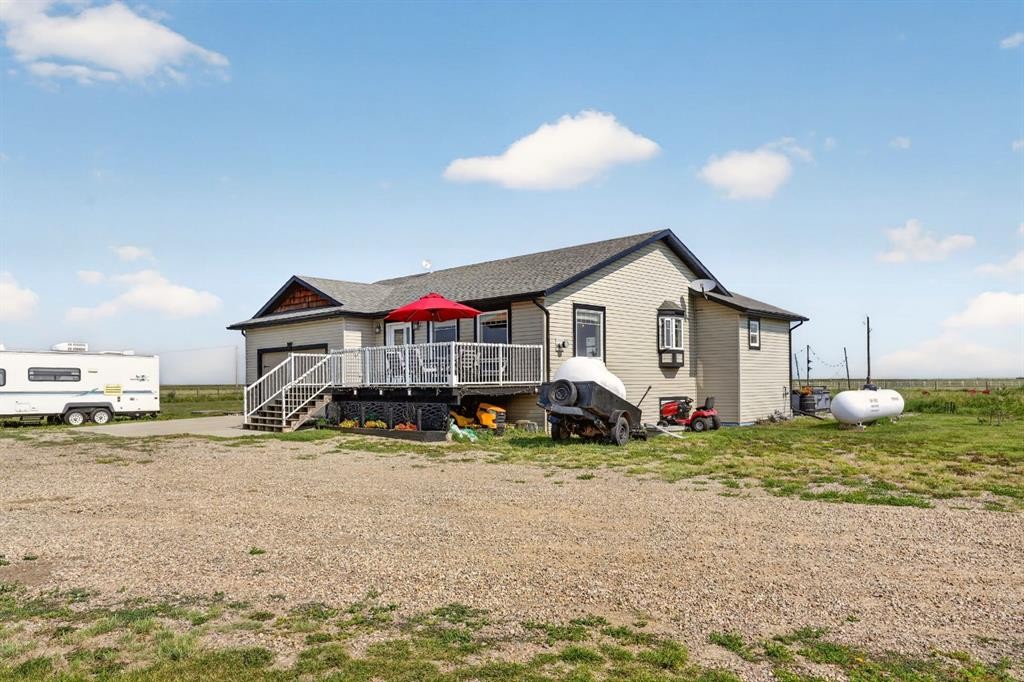 65004 Range Road 19-5, Stirling, AB - Outdoor With Deck Patio Veranda