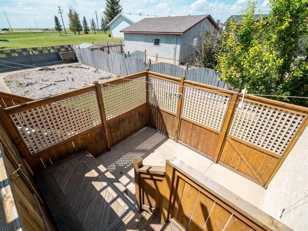 122 Spruce Drive, Coalhurst, AB - Outdoor With Deck Patio Veranda With Exterior