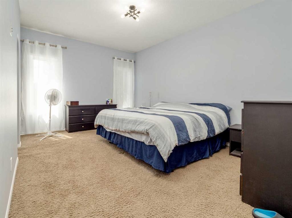 695 Parkside Drive, Coaldale, AB - Indoor Photo Showing Bedroom
