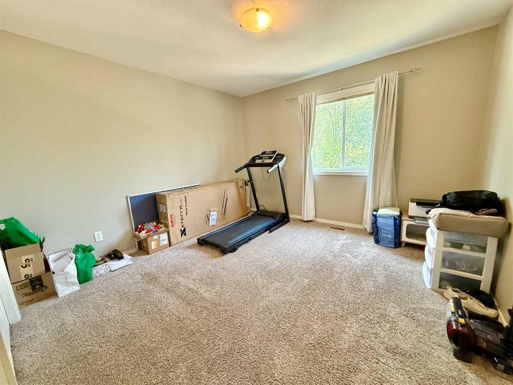 2-109 Silkstone Road West, Lethbridge, AB - Indoor Photo Showing Gym Room