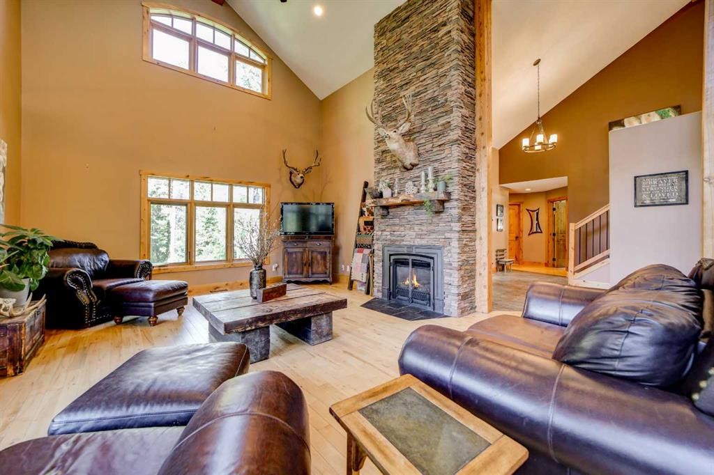 2411 63 Street, Coleman, AB - Indoor Photo Showing Living Room With Fireplace