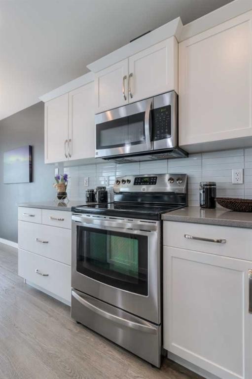 4-1220 Keystone, Lethbridge, AB - Indoor Photo Showing Kitchen With Stainless Steel Kitchen With Upgraded Kitchen