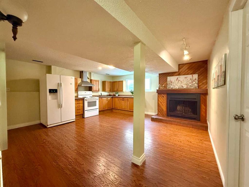 159 Laval Boulevard West, Lethbridge, AB - Indoor With Fireplace