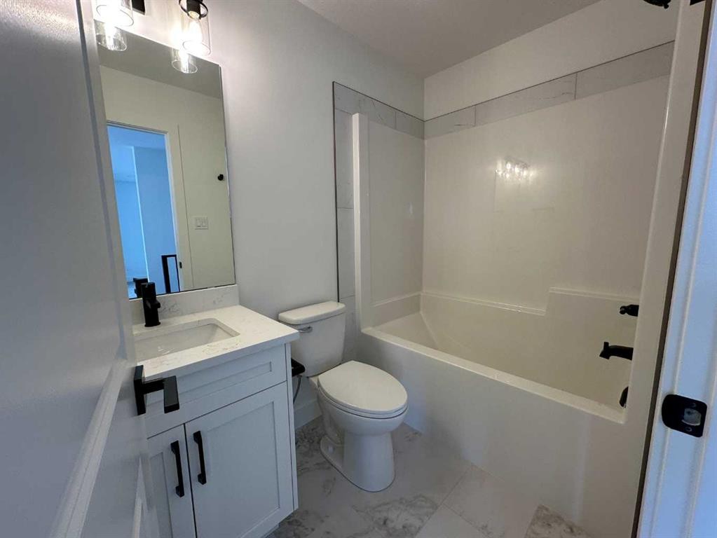 8305 18 Avenue, Coleman, AB - Indoor Photo Showing Bathroom