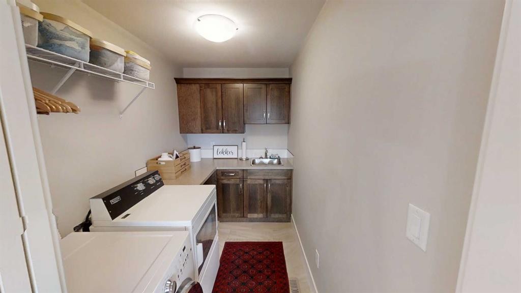 320 Stonecrest Place West, Lethbridge, AB - Indoor Photo Showing Laundry Room