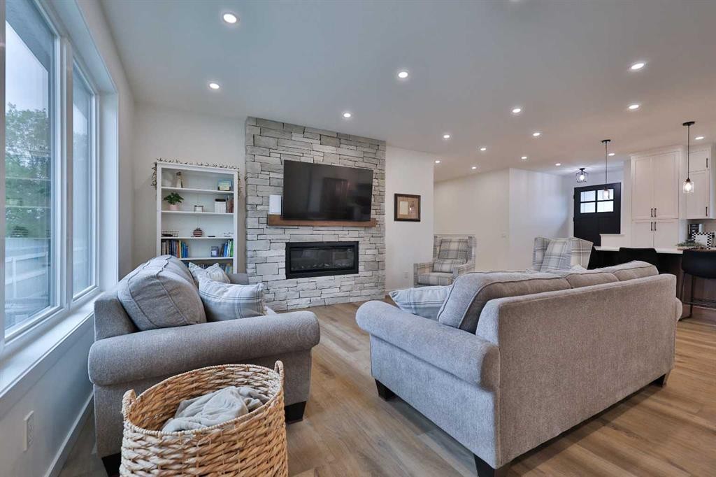 246 4A Street, Stirling, AB - Indoor Photo Showing Living Room With Fireplace