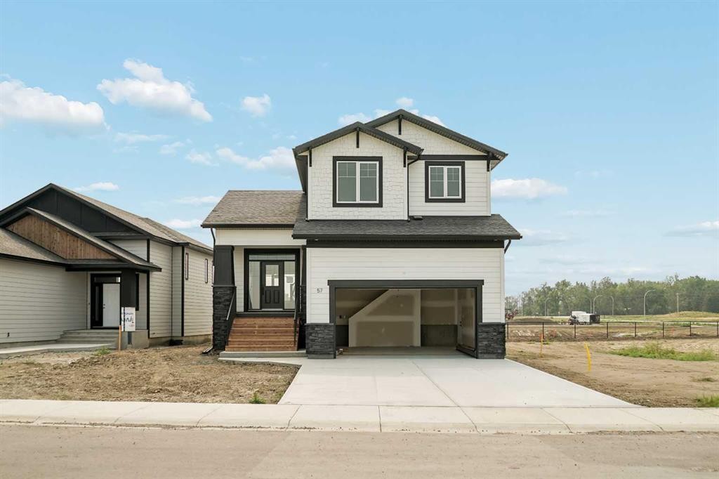 57 Malloy Terrace, Coaldale, AB - Outdoor With Facade