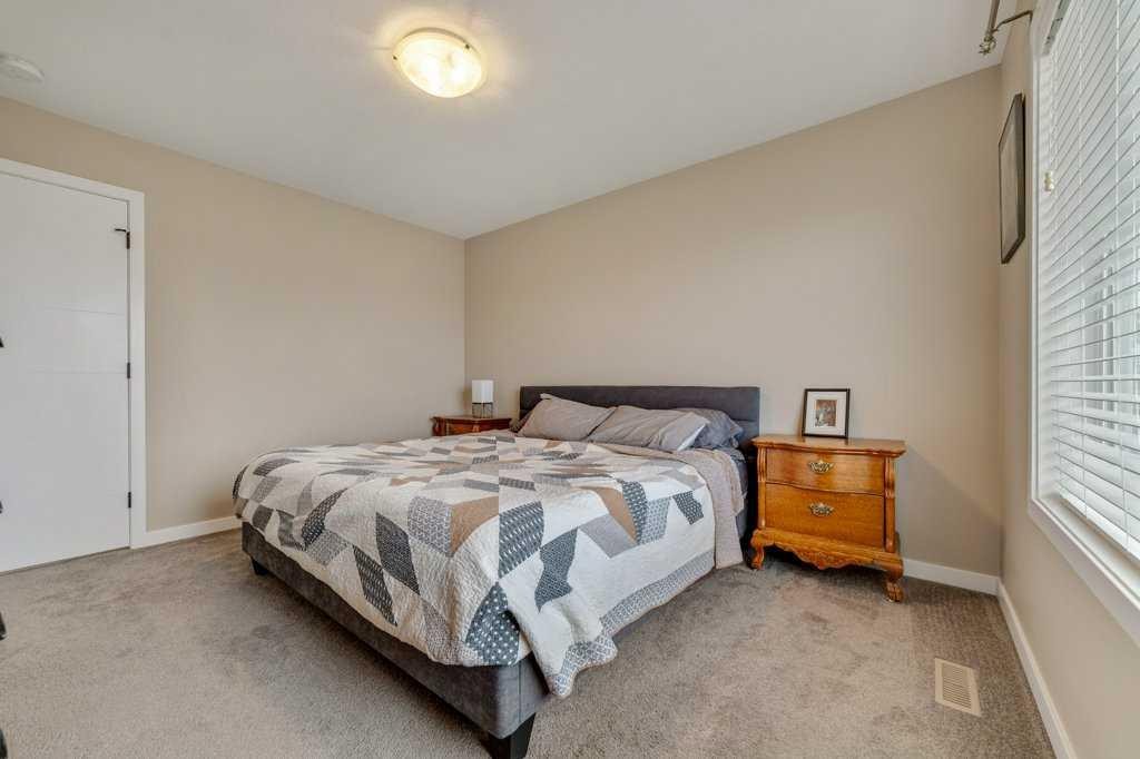 809 Greywolf Run North, Lethbridge, AB - Indoor Photo Showing Bedroom