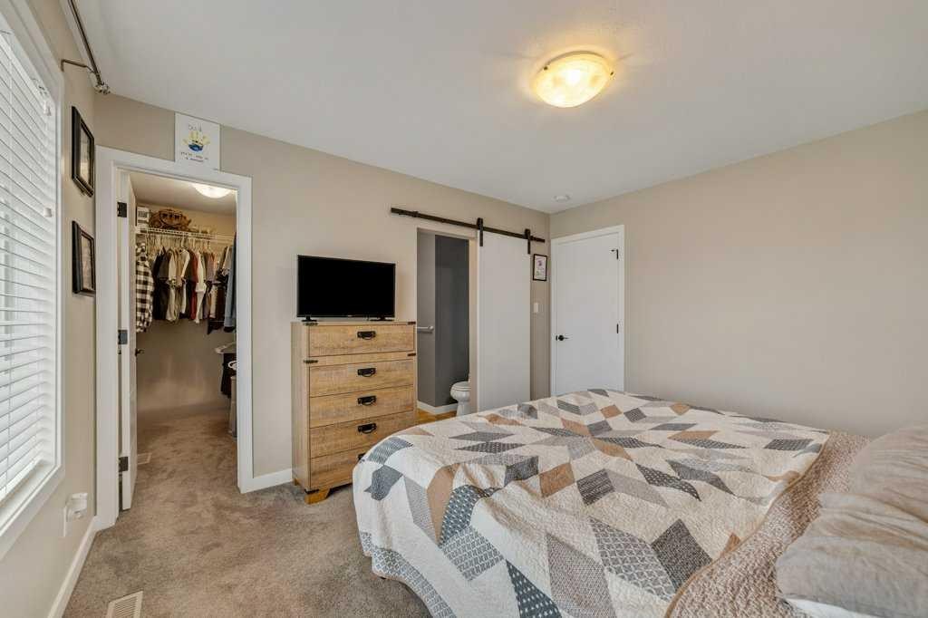 809 Greywolf Run North, Lethbridge, AB - Indoor Photo Showing Bedroom