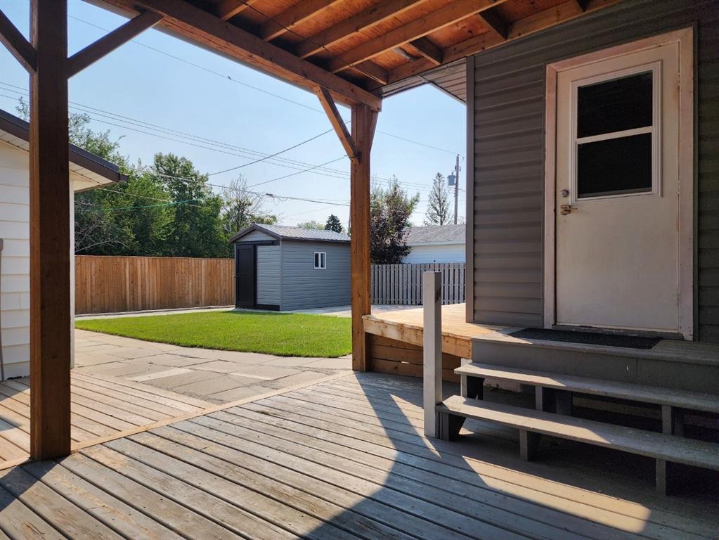 5122 5Th Street West, Claresholm, AB - Outdoor With Deck Patio Veranda With Exterior