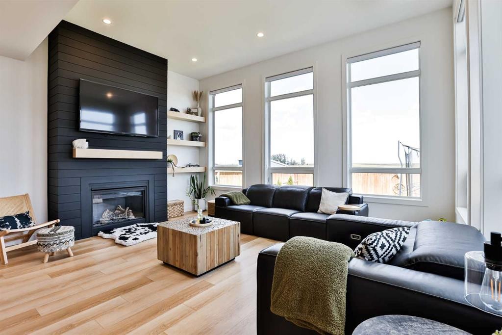 4241 60 Avenue, Taber, AB - Indoor Photo Showing Living Room With Fireplace
