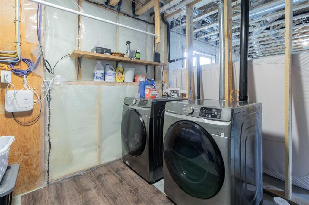403 Caledonia Boulevard West, Lethbridge, AB - Indoor Photo Showing Laundry Room
