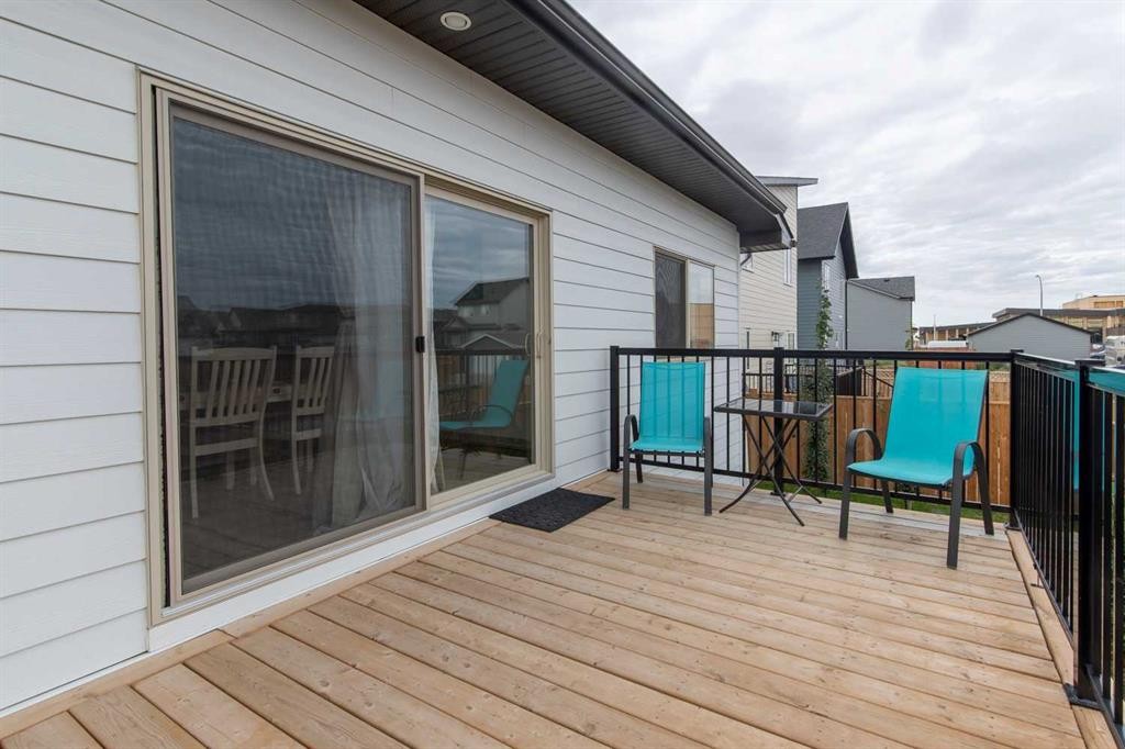 403 Caledonia Boulevard West, Lethbridge, AB - Outdoor With Deck Patio Veranda With Exterior