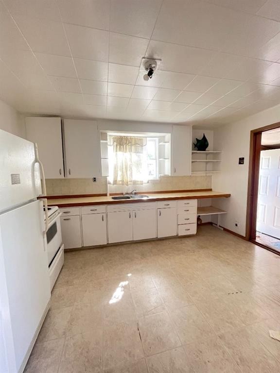 4829 56Th Avenue, High Prairie, AB - Indoor Photo Showing Kitchen With Double Sink