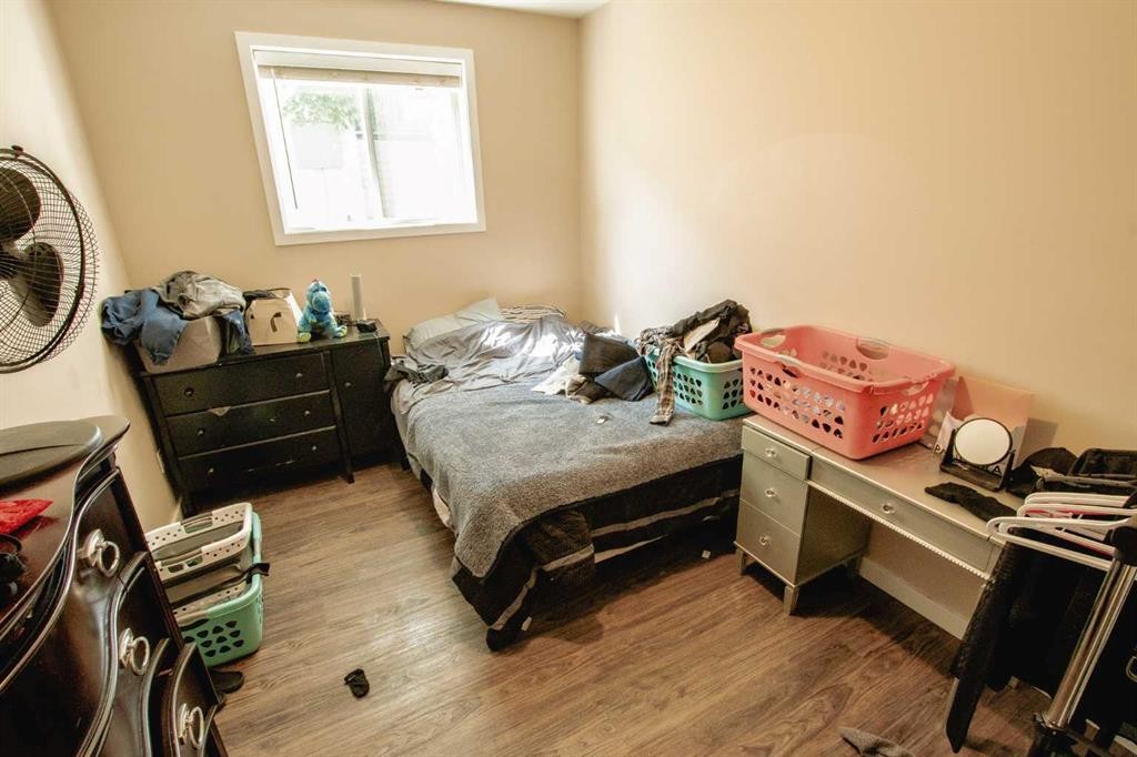 A&B-10028 104 Avenue, Grande Prairie, AB - Indoor Photo Showing Bedroom