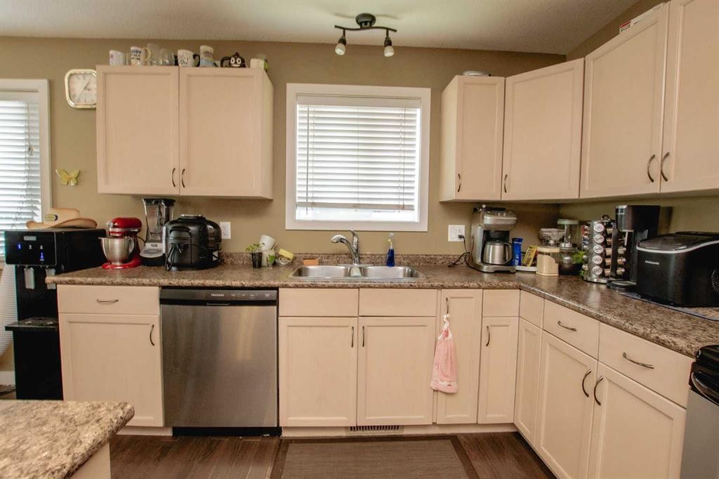 A&B-10028 104 Avenue, Grande Prairie, AB - Indoor Photo Showing Kitchen With Double Sink