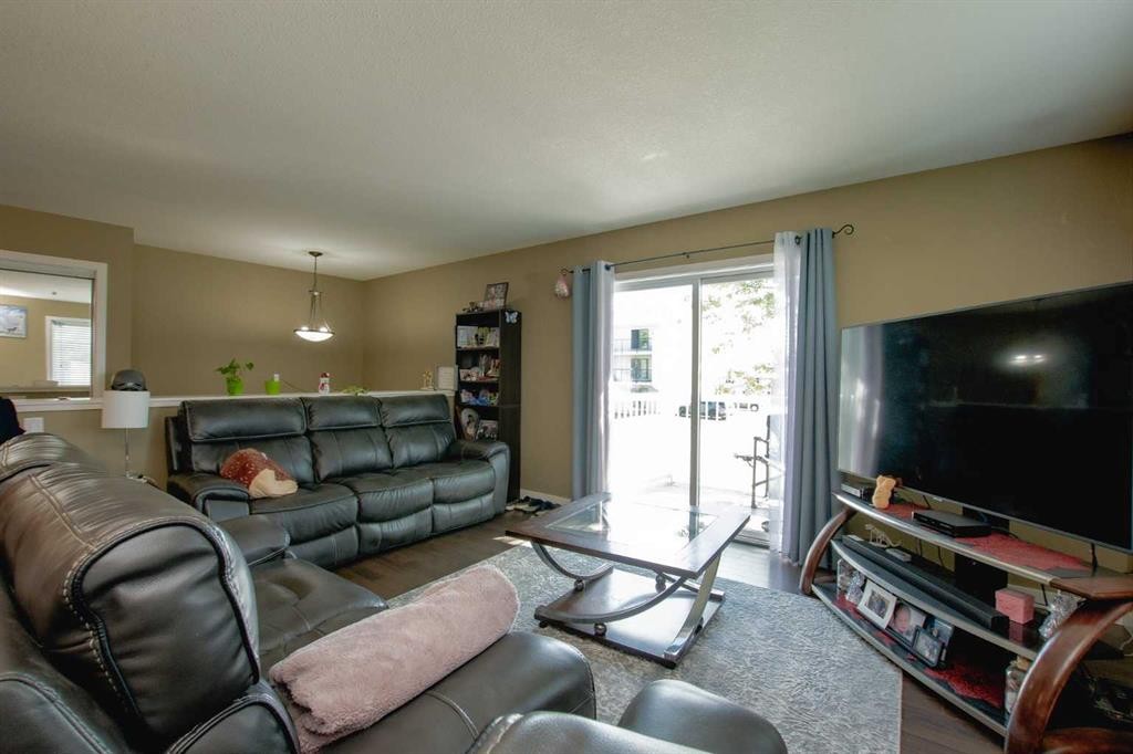 A&B-10028 104 Avenue, Grande Prairie, AB - Indoor Photo Showing Living Room