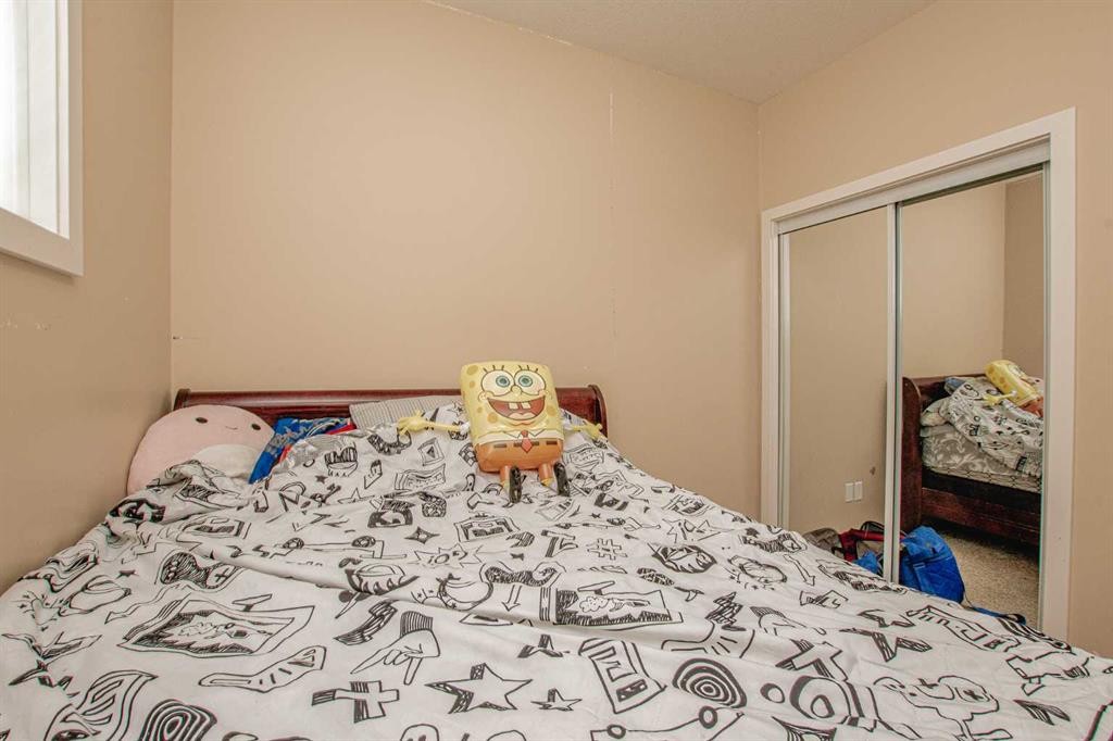 A&B-10028 104 Avenue, Grande Prairie, AB - Indoor Photo Showing Bedroom