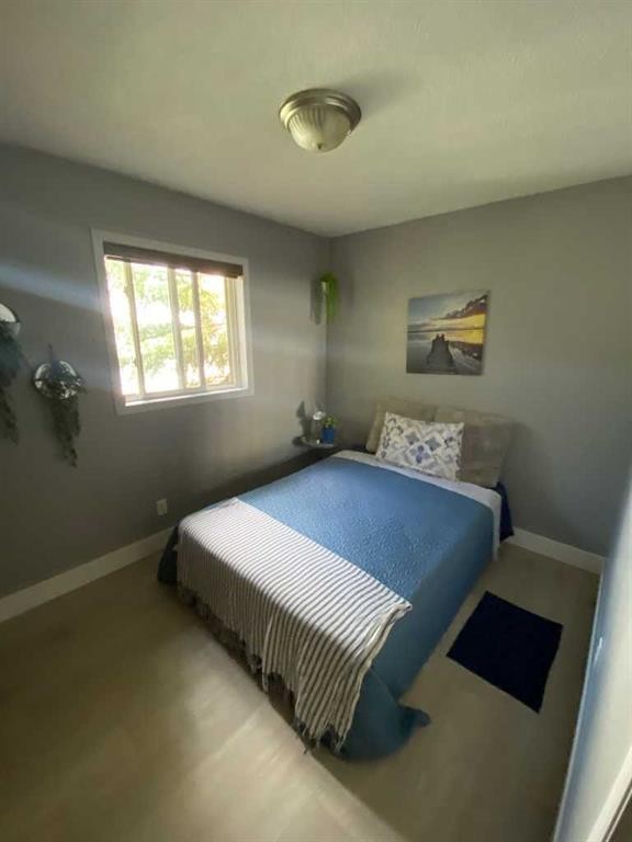 7607 Michealis Boulevard, Grande Prairie, AB - Indoor Photo Showing Bedroom