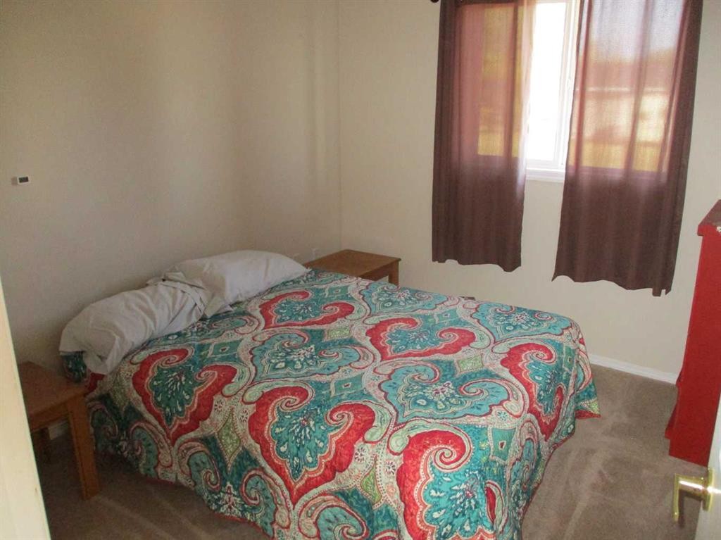 804 2Nd Street Nw, Manning, AB - Indoor Photo Showing Bedroom