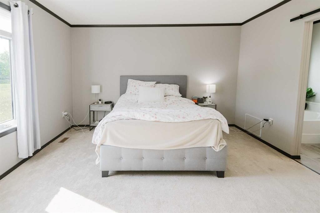 220 Riverdrive Lane, Rural Mackenzie County, AB - Indoor Photo Showing Bedroom