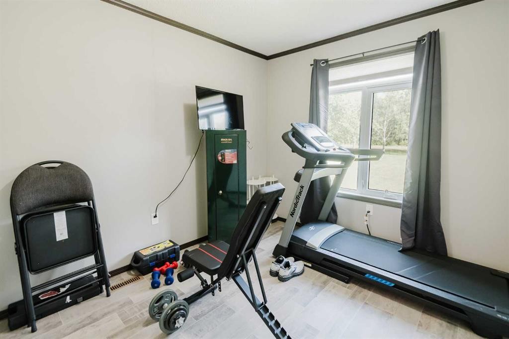 220 Riverdrive Lane, Rural Mackenzie County, AB - Indoor Photo Showing Gym Room