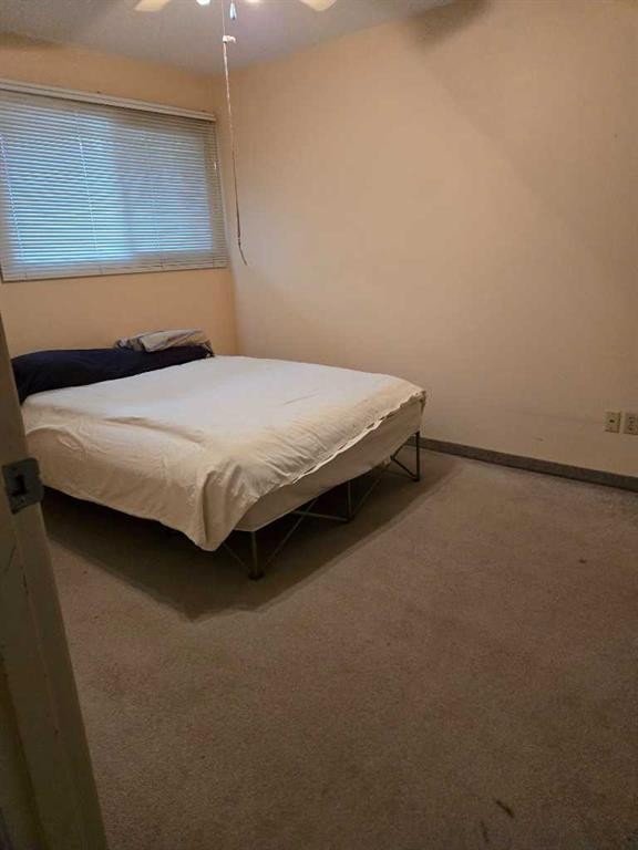 207-9738 82 Avenue, Grande Prairie, AB - Indoor Photo Showing Bedroom