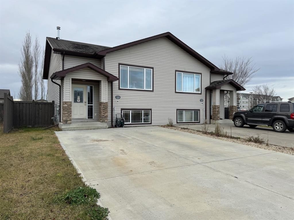 12026 102A Street, Grande Prairie, AB - Outdoor With Facade