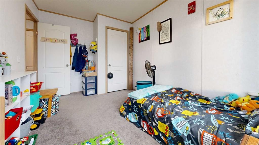 8810 90 Street, Grande Prairie, AB - Indoor Photo Showing Bedroom