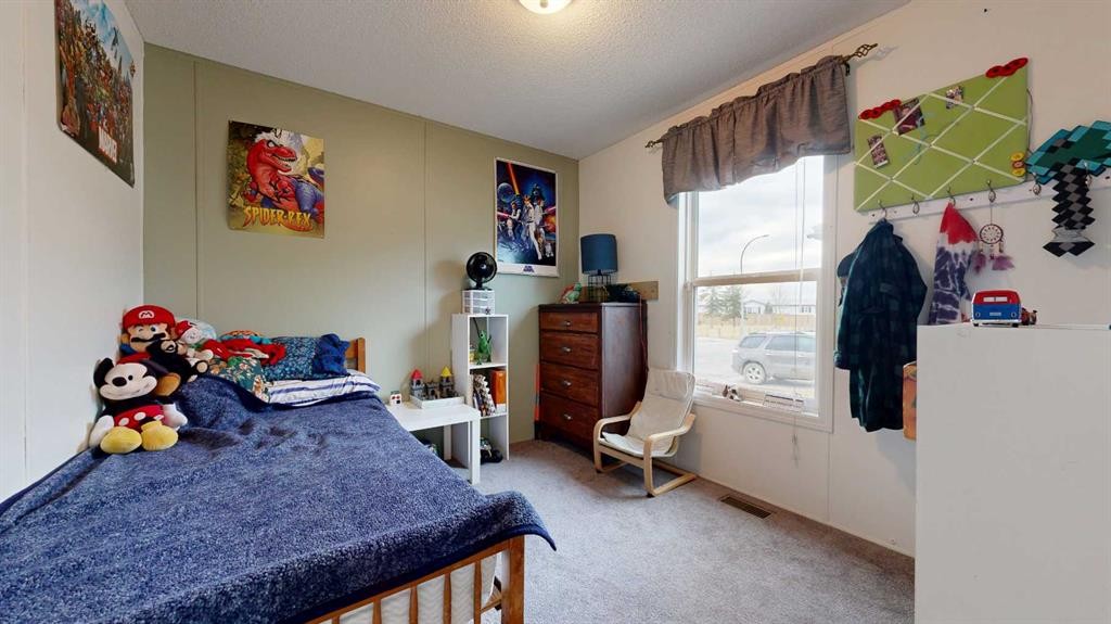 8810 90 Street, Grande Prairie, AB - Indoor Photo Showing Bedroom
