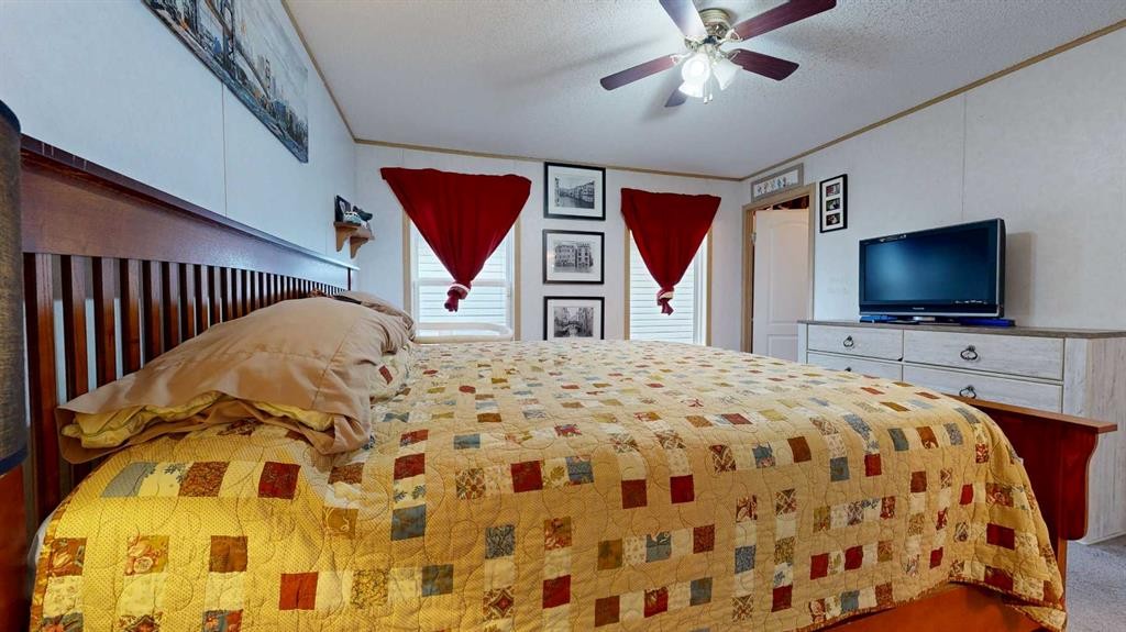 8810 90 Street, Grande Prairie, AB - Indoor Photo Showing Bedroom