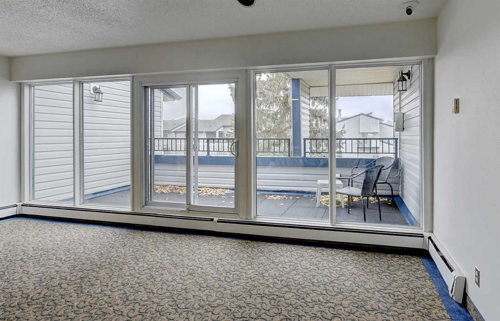 1209-7201 Poplar Drive, Grande Prairie, AB - Indoor Photo Showing Other Room