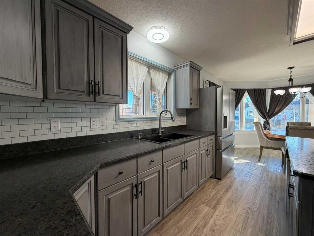 829 Cherry Street, Beaverlodge, AB - Indoor Photo Showing Kitchen With Double Sink