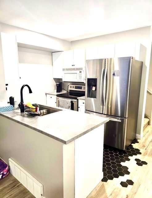 7204 105 Street, Grande Prairie, AB - Indoor Photo Showing Kitchen With Stainless Steel Kitchen