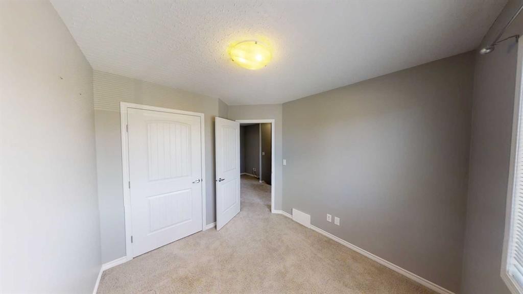 129-9105 91 Street, Grande Prairie, AB - Indoor Photo Showing Other Room