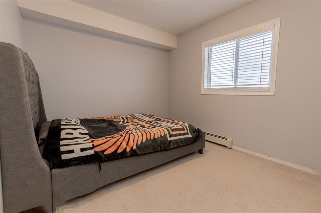 #414-11240 104 Avenue, Grande Prairie, AB - Indoor Photo Showing Bedroom