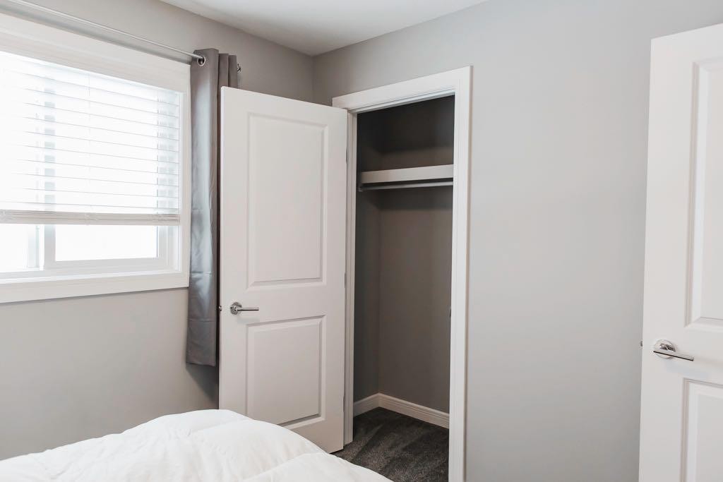 8070 91 Street, Grande Prairie, AB - Indoor Photo Showing Bedroom