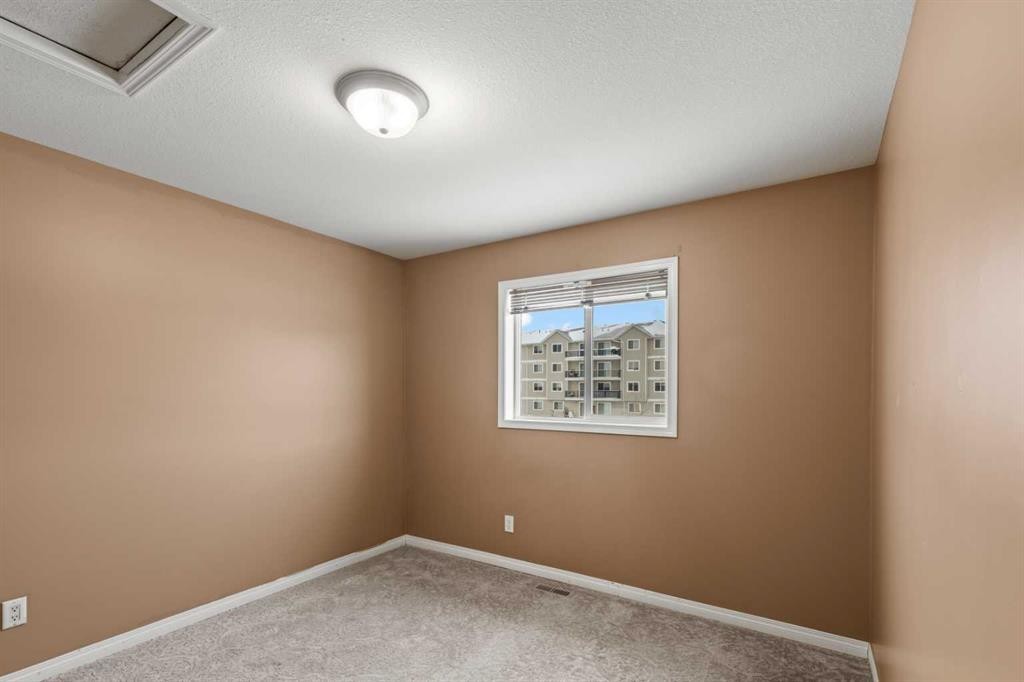 330-10150 121 Avenue, Grande Prairie, AB - Indoor Photo Showing Other Room
