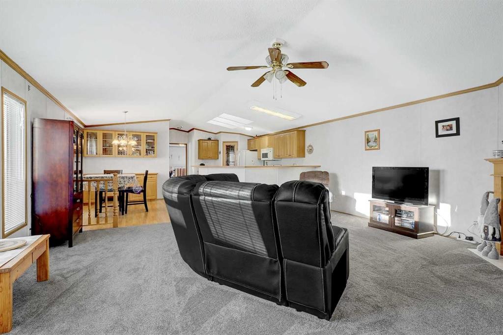 12134 97B Street, Grande Prairie, AB - Indoor Photo Showing Other Room With Fireplace