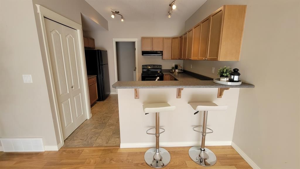 101C-8640 103 Avenue, Grande Prairie, AB - Indoor Photo Showing Kitchen