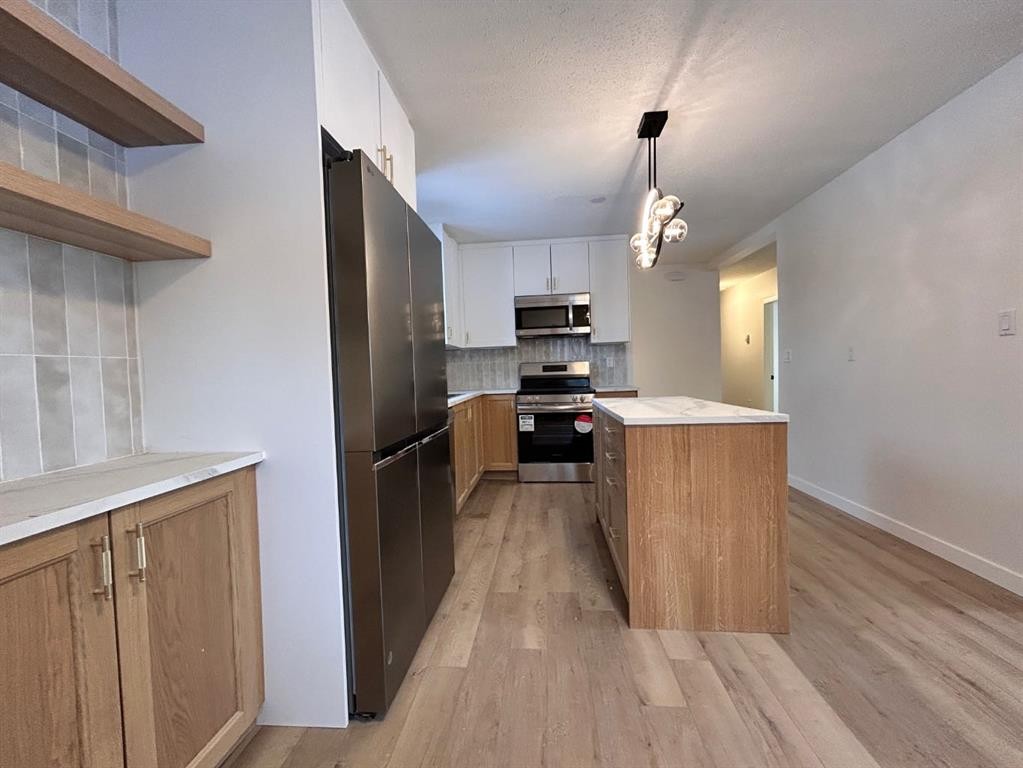 11400 105 Avenue, Fairview, AB - Indoor Photo Showing Kitchen With Stainless Steel Kitchen