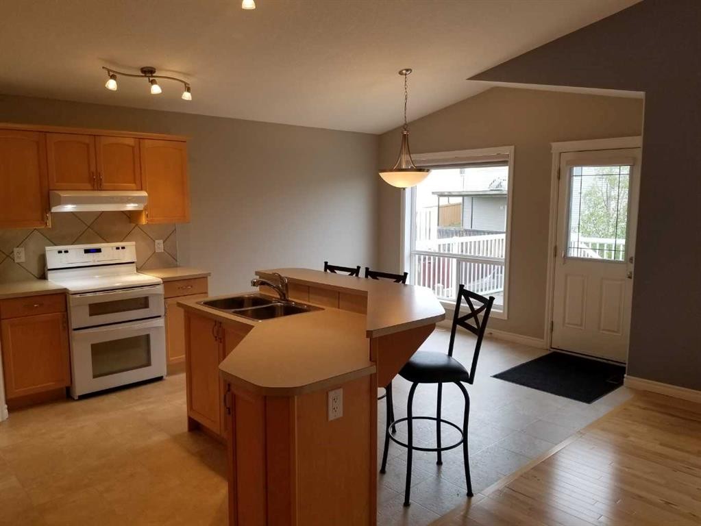 8814 114 Avenue, Grande Prairie, AB - Indoor Photo Showing Kitchen With Double Sink