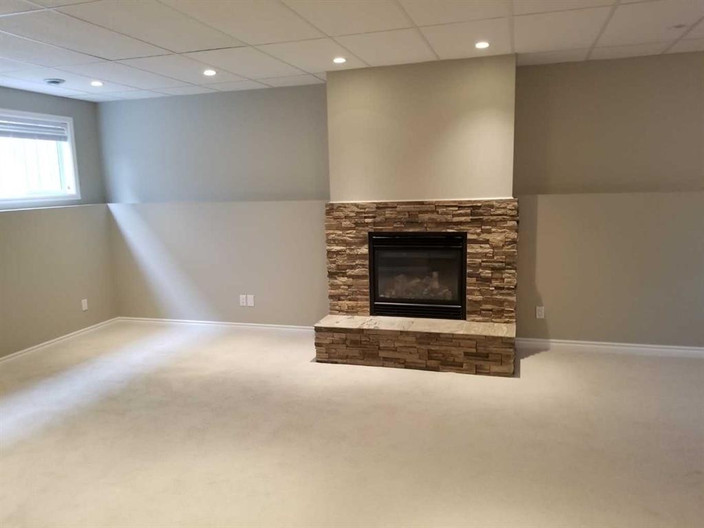 8814 114 Avenue, Grande Prairie, AB - Indoor With Fireplace