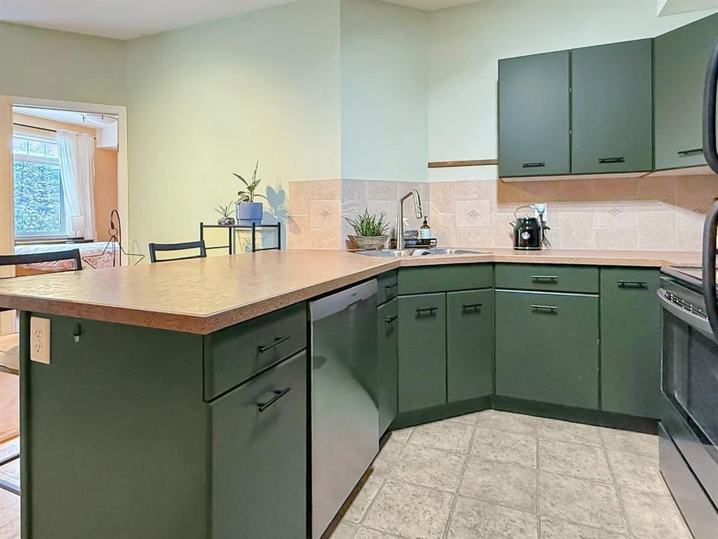 306-160 Moberly, Grande Cache, AB - Indoor Photo Showing Kitchen