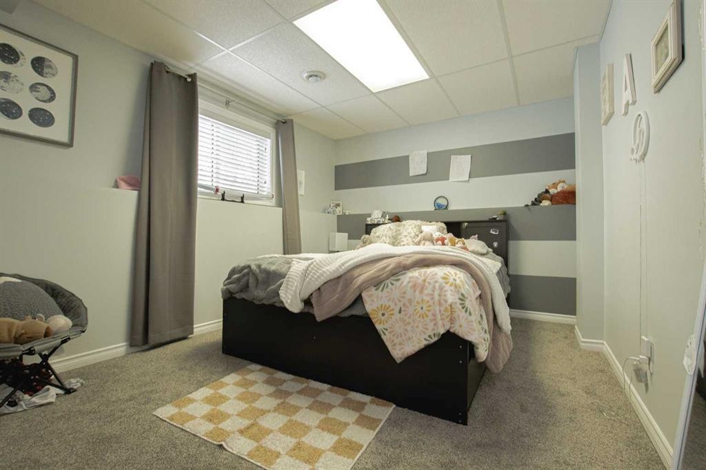 7610 106A Street, Grande Prairie, AB - Indoor Photo Showing Bedroom