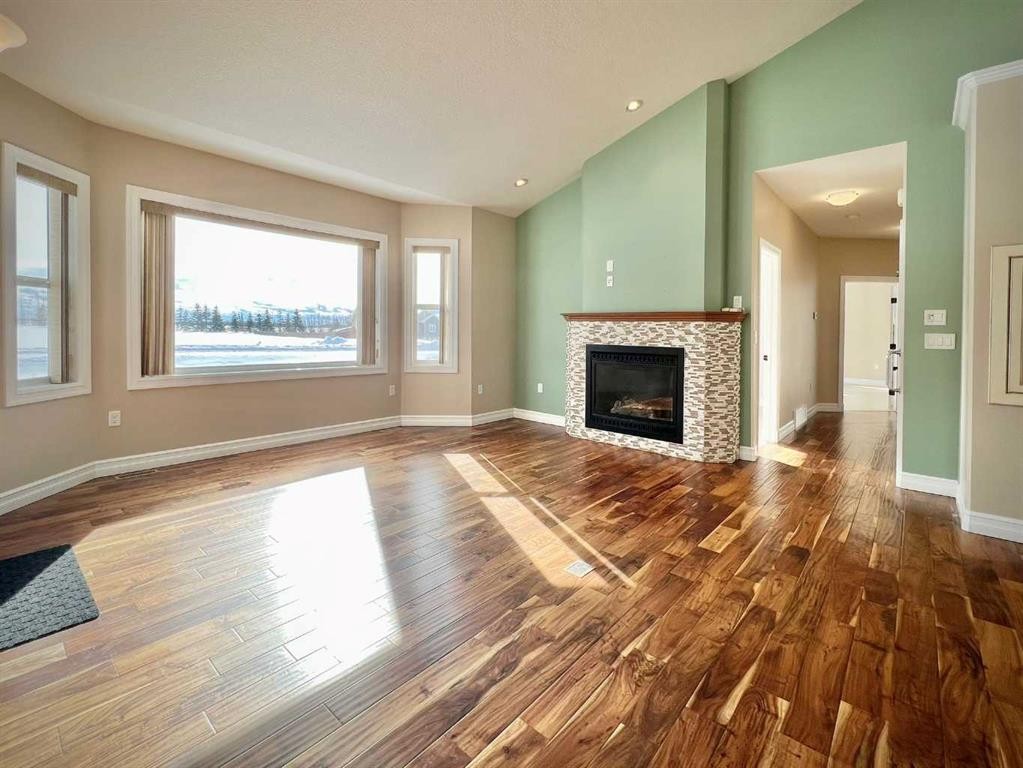 36-1049 Alberta Avenue, Debolt, AB - Indoor Photo Showing Living Room With Fireplace