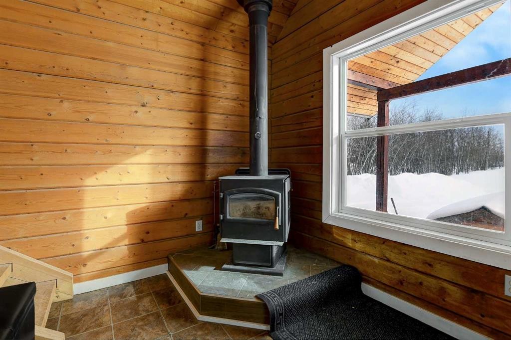 730080 Range Road 32, Teepee Creek, AB - Indoor With Fireplace